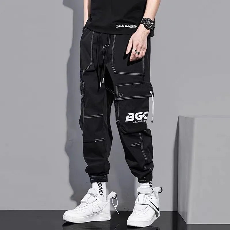 Men's loose fit polyester solid colour trousers in black or gray, autumn casual style, size S to 5XL