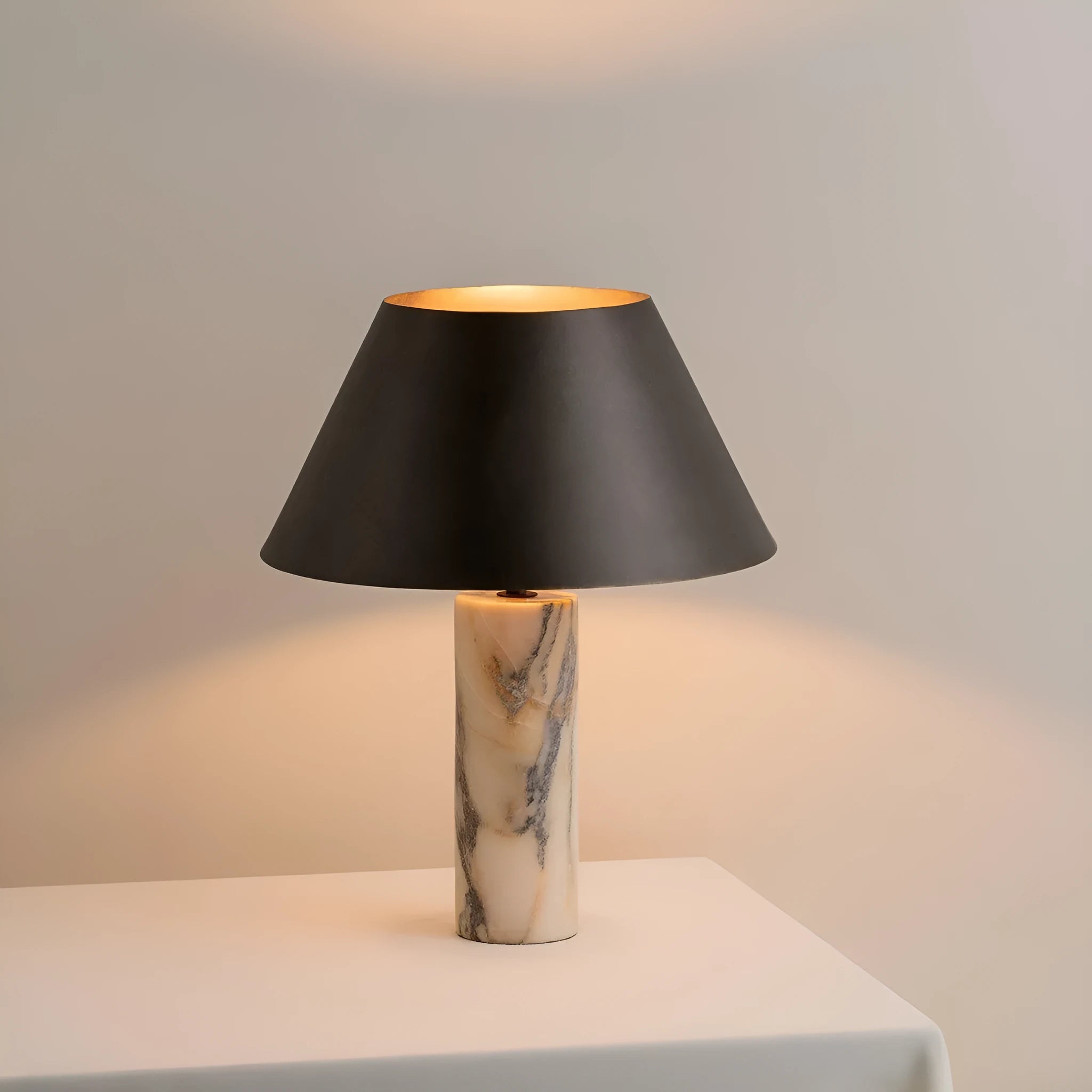 Black marble modern table lamp on a wooden surface with EU and US plug options.
