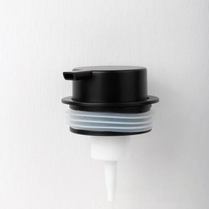 Facial cleanser foam pump with large plastic head in various metallic finish options.