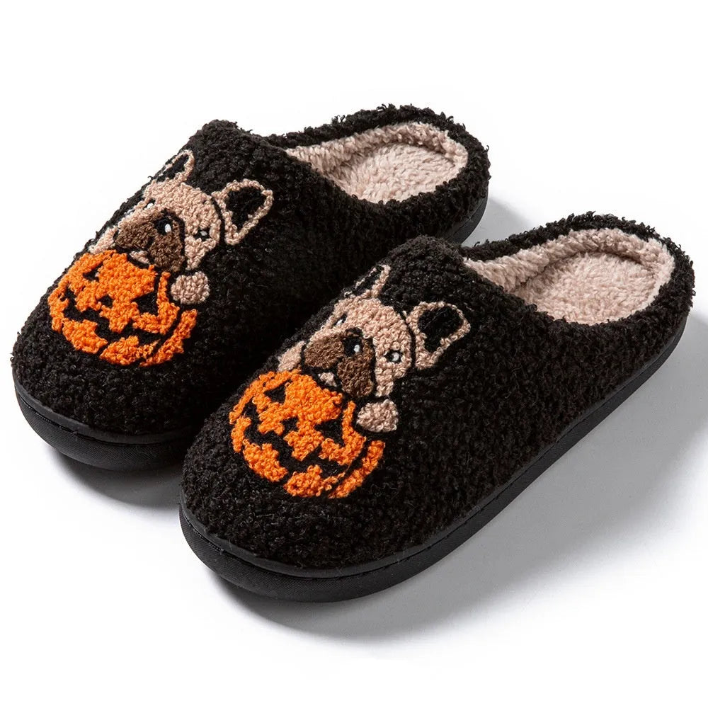 Halloween pumpkin design plush slippers with TPR rubber soles in white or black.