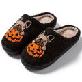 Halloween pumpkin design plush slippers with TPR rubber soles in white or black.