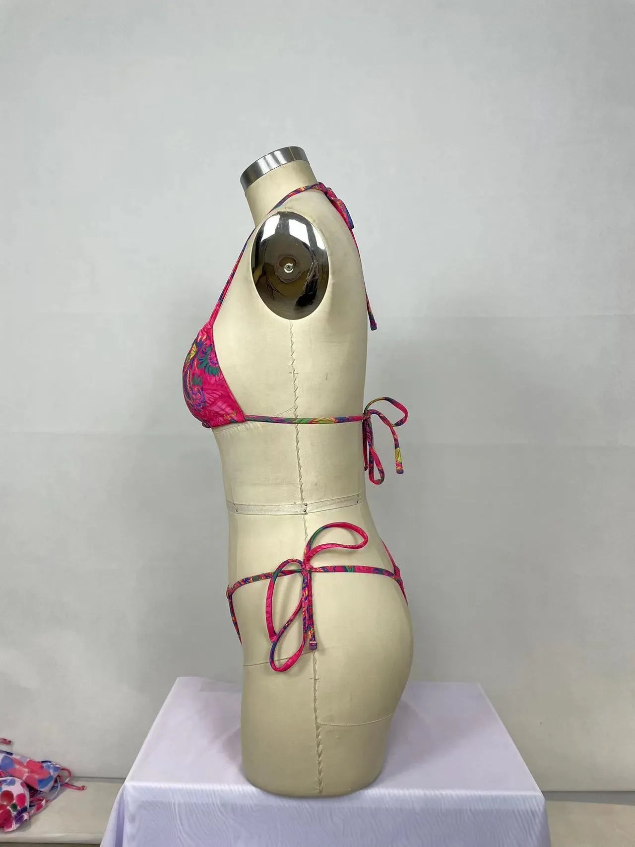Women's printed bikini two-piece set in pink with triangle top and high-waist bottoms