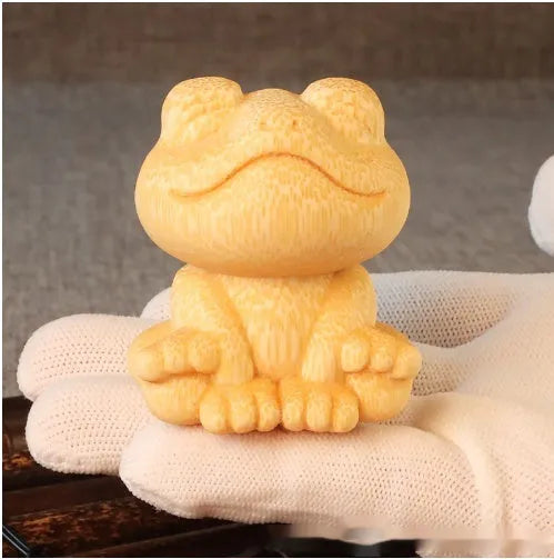 Solid bamboo carving ornament with smiling frog cartoon design, 5cm height