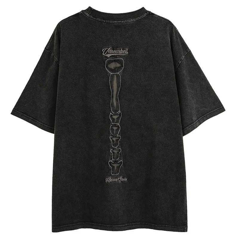 Loose fit black cotton t-shirt with a skull and printed letter design on the front.