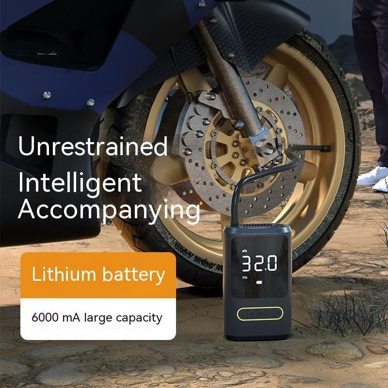 Handheld wireless digital display air pump with LED light shown inflating a car tyre