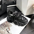 Women's low-top sneakers with wedge heel platform, cross-strap detail on synthetic leather upper, in creamy white colour.