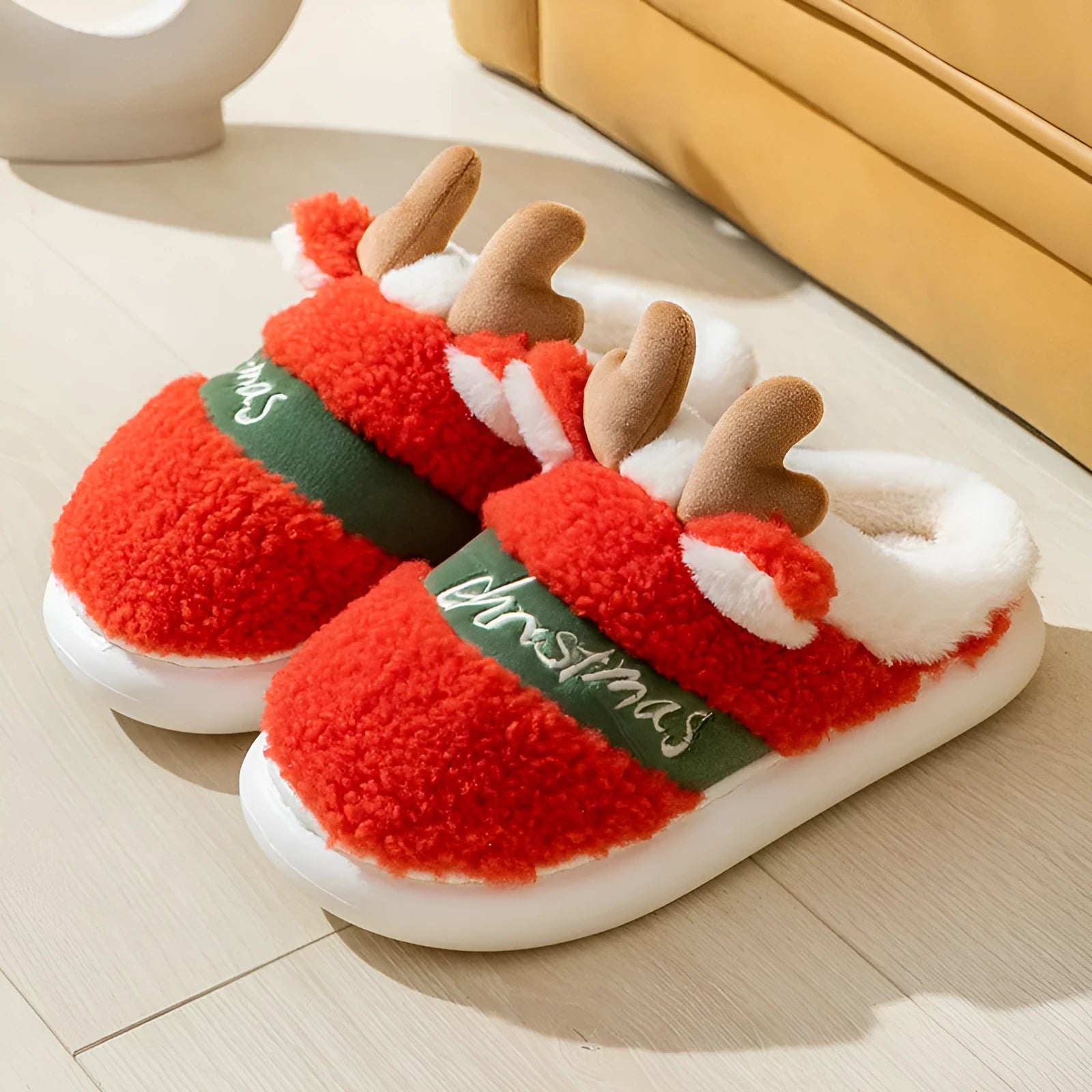 Christmas winter home slippers with suede upper and EVA sole in antler pink colour