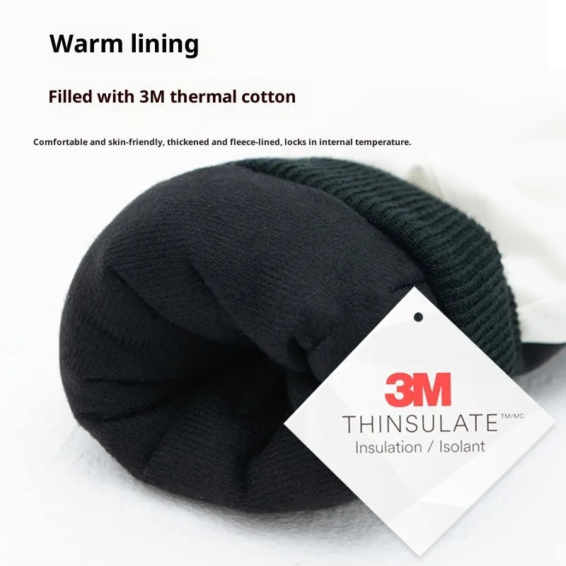 Pair of waterproof warm ski gloves with touch screen fingers and non-slip palm in black colour on white background