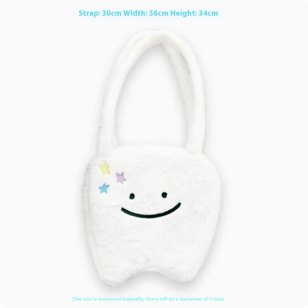 White plush shoulder tote bag with a large capacity and playful cute teeth design, shown with a crossbody strap.