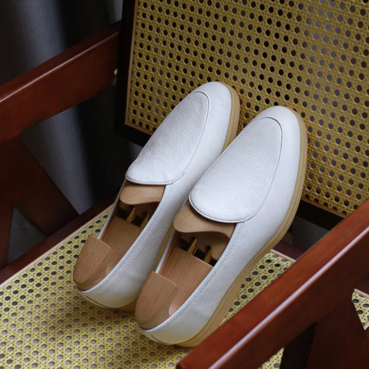 British handmade men's genuine leather loafers in brown with a flat TPR sole.