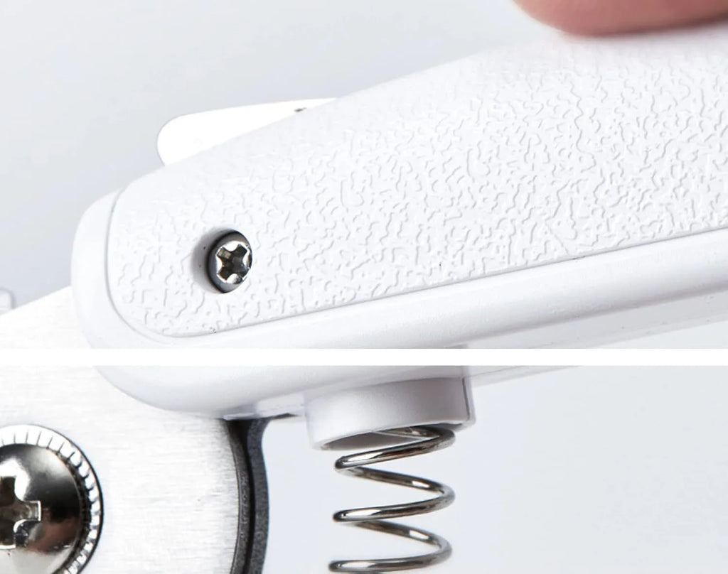 White LED pet nail clipper with a triangular blade, anti-splash guard, and leatherette handle.