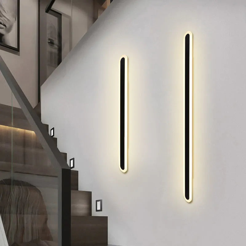LED line wall lamp with wrought iron frame and acrylic diffuser in black warm light finish
