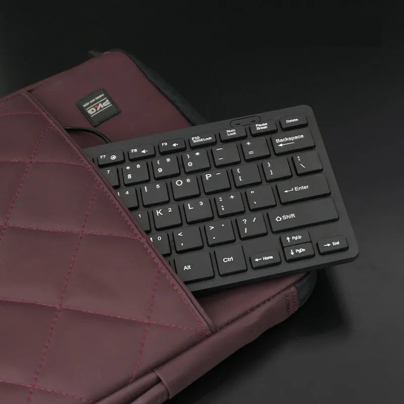 USB wired mini keyboard in black, white, pink, or blue colours with compact design