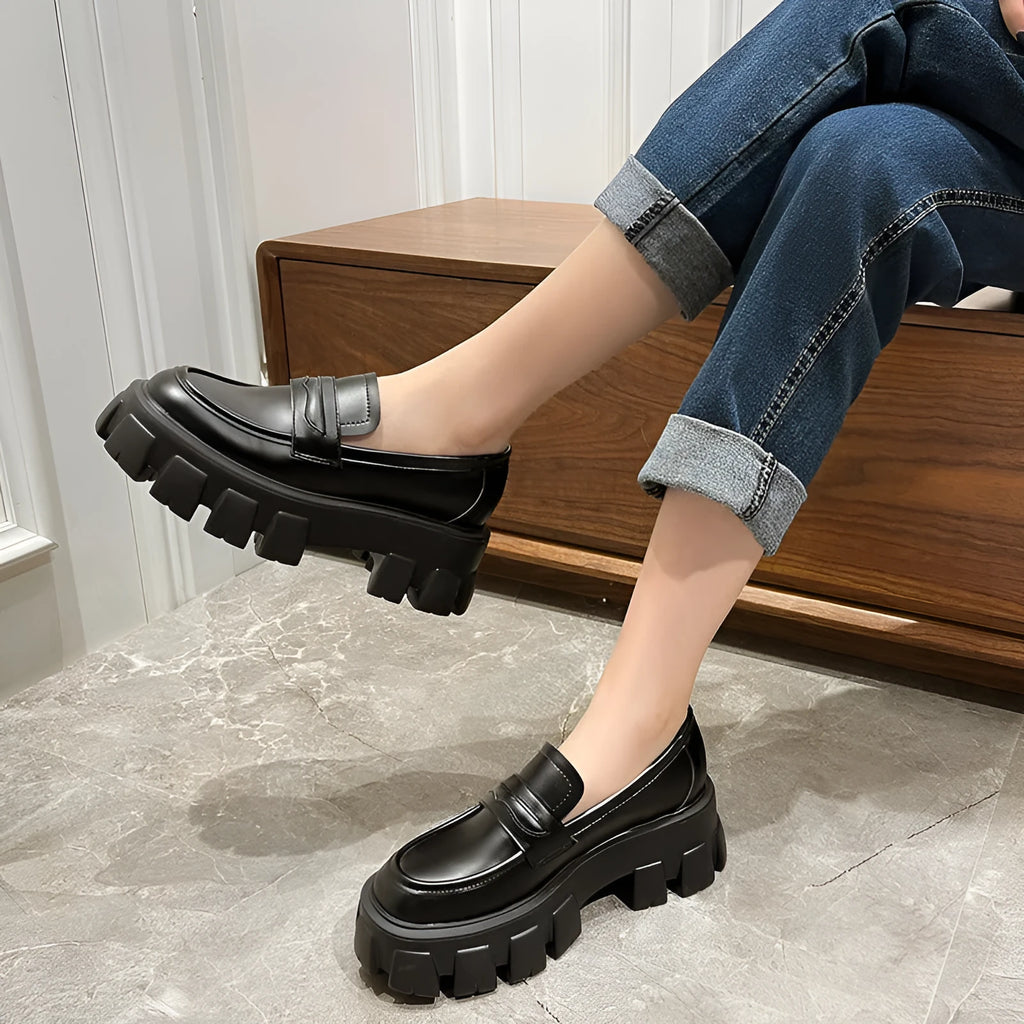 British style wide fit loafers in patent leather with a muffin base heel and rubber sole