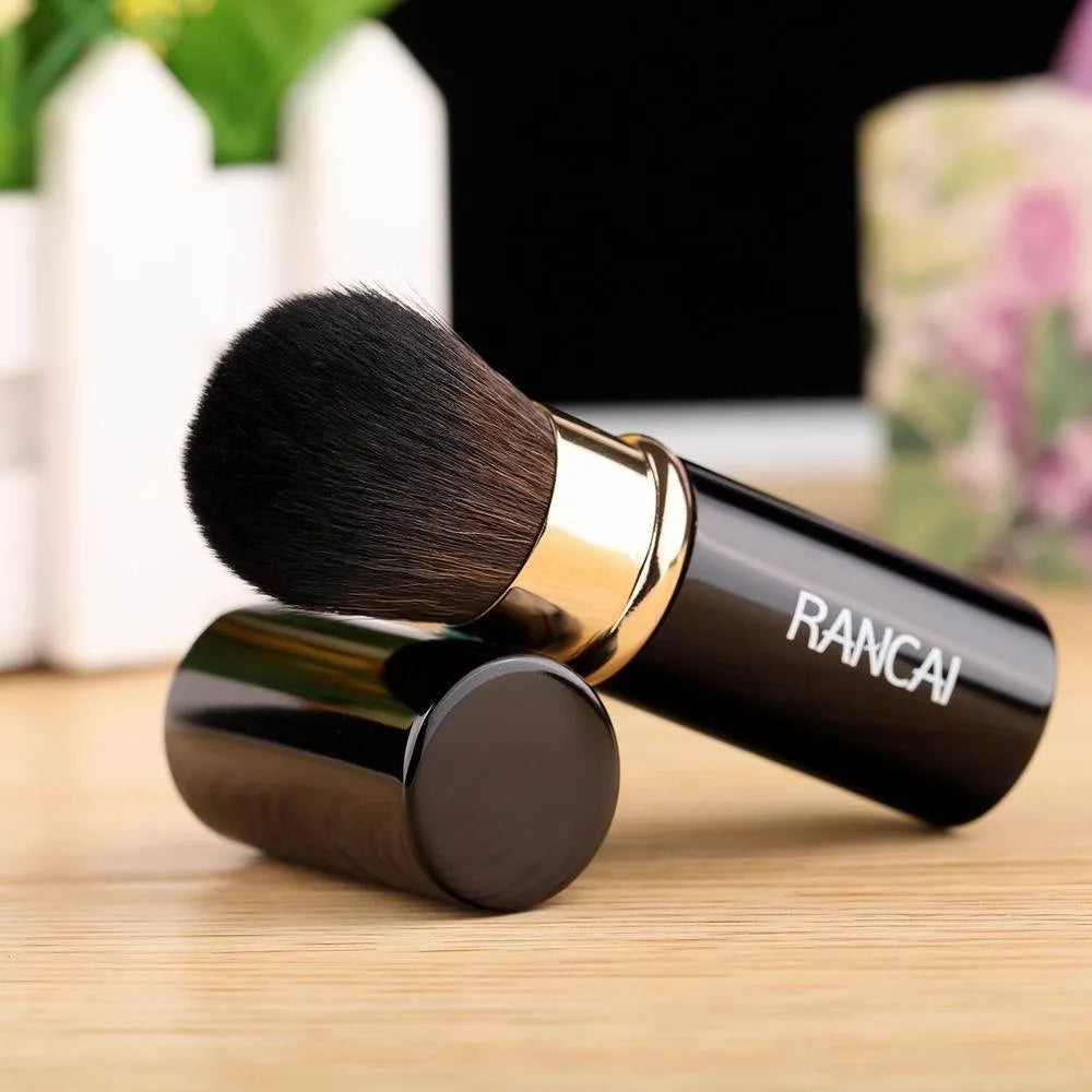 Mini retractable makeup brush with aluminium tube and fibre wool bristles, 9cm long, black colour