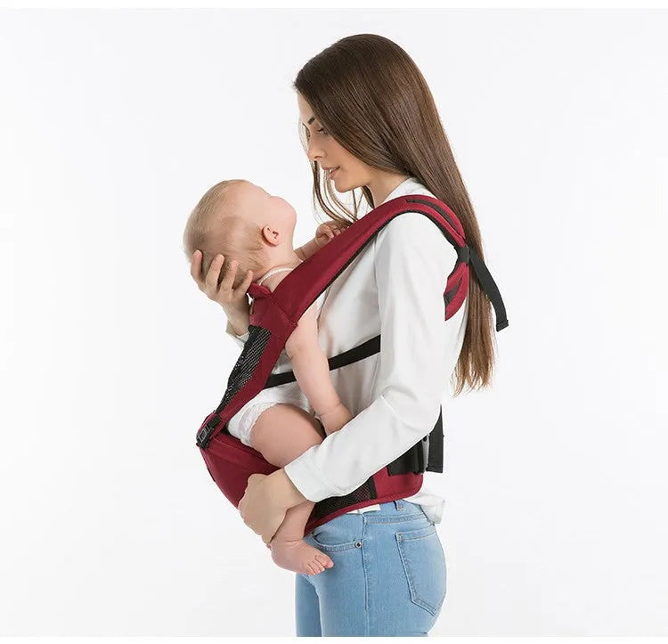 Multifunctional baby carrier in black, 100% cotton, with waist support and three carrying positions for newborn to toddler