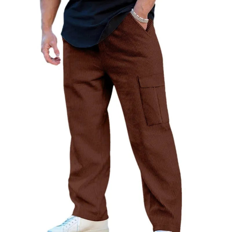 Men's corduroy cargo trousers in loose fit wide-leg design with elastic waist