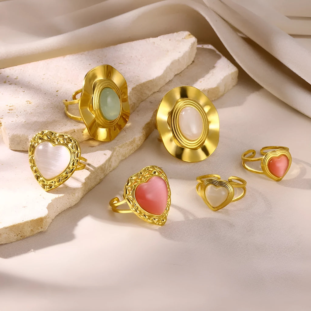 Retro stainless steel heart-shaped pendant ring with open band and asymmetric wave design