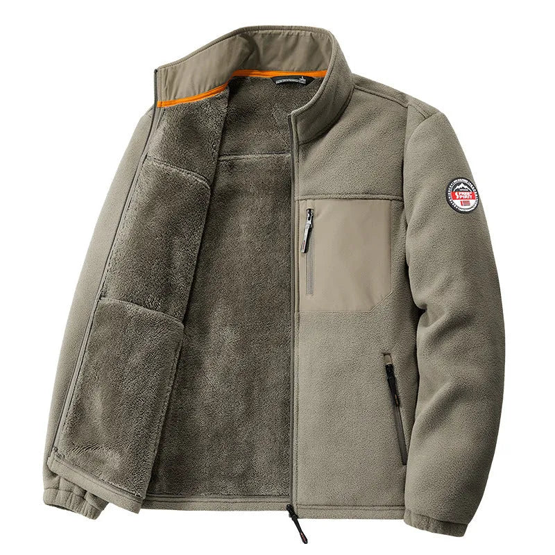 Man wearing a solid coloured thickened fleece cardigan jacket with zippered pockets