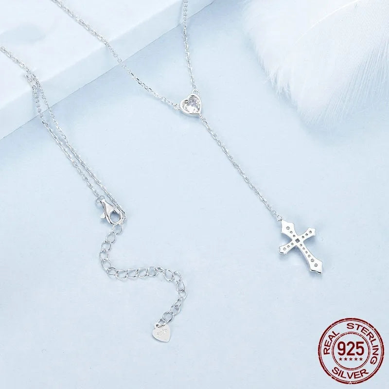 Silver love cross pendant necklace for women with 925 sterling silver pendant and O-ring chain.
