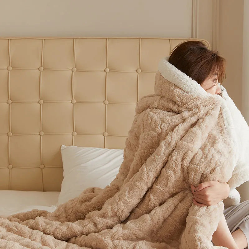 Polyester thermal flannel blanket in beige colour, shown folded to display its thick texture and modern style