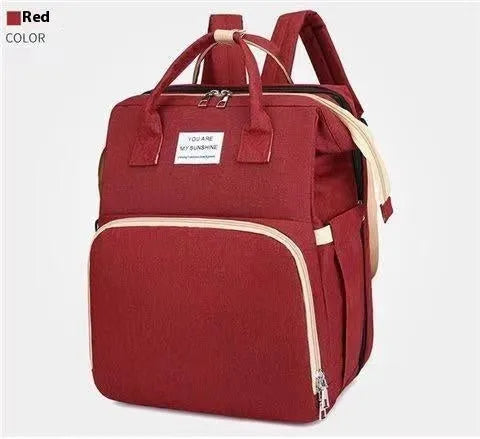 Portable lightweight nylon folding baby changing bag with USB port and shoulder strap in selected colour.