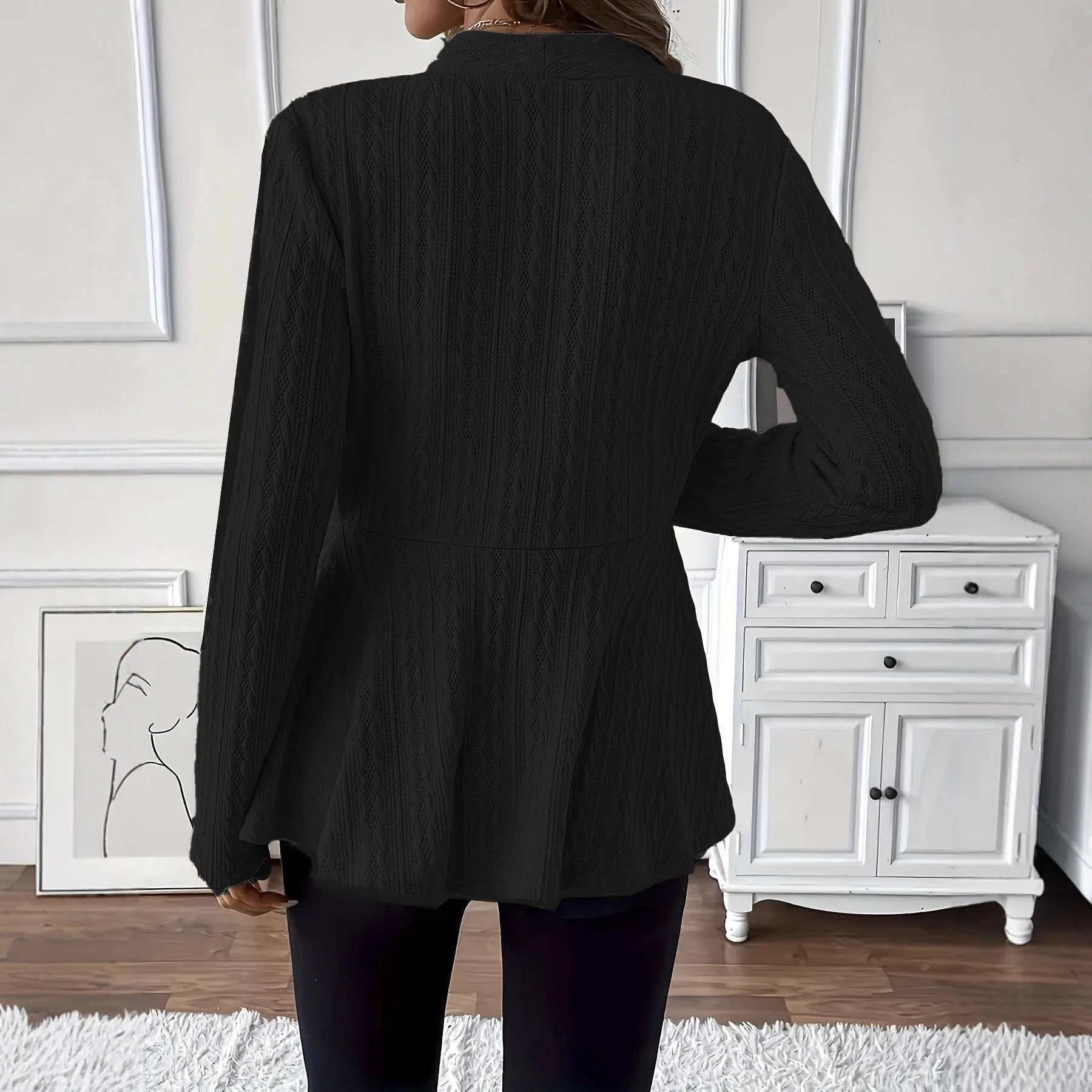 Women's fitted knitted cardigan in apricot colour with one-button fastening and jacquard pattern