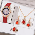 Women's quartz watch bracelet set with faux leather strap, circular dial, and matching jewellery in a colour suit