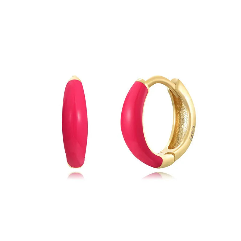 Curved oval epoxy earrings with colourful drip finish in geometric U-shape design