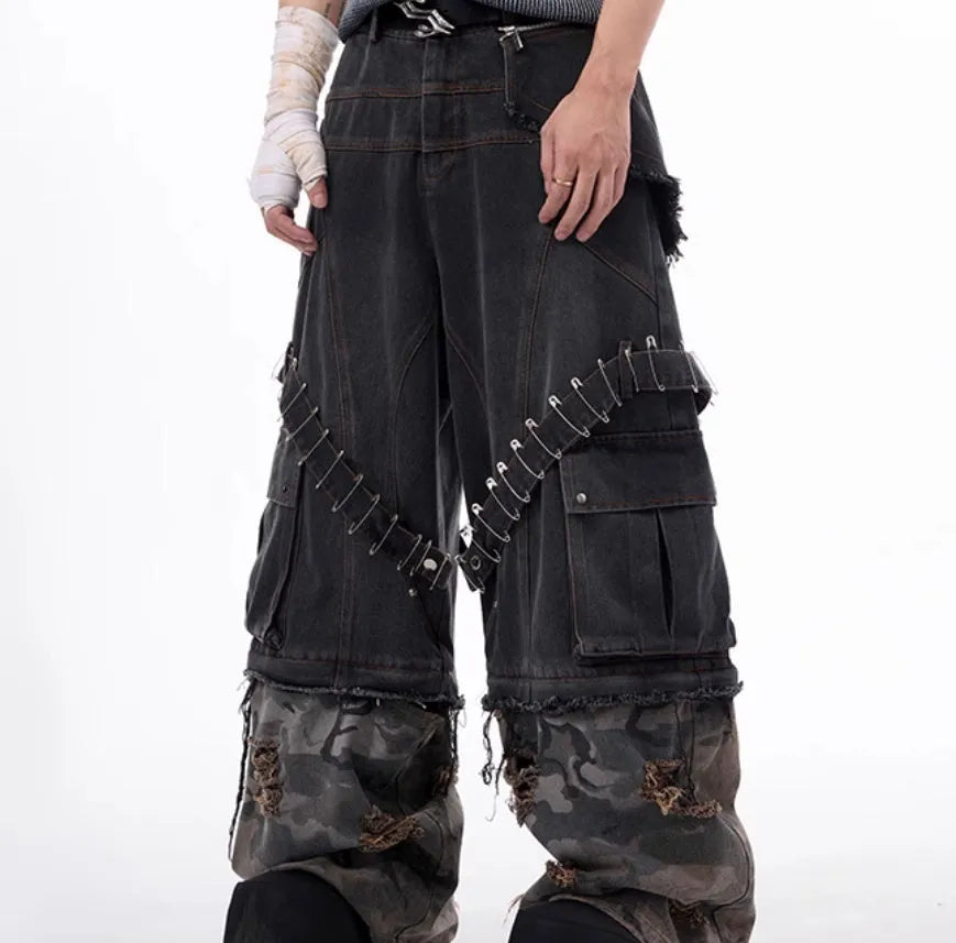 Men's grey jeans with camouflage pattern splicing and decorative pin and ribbon details on cotton denim