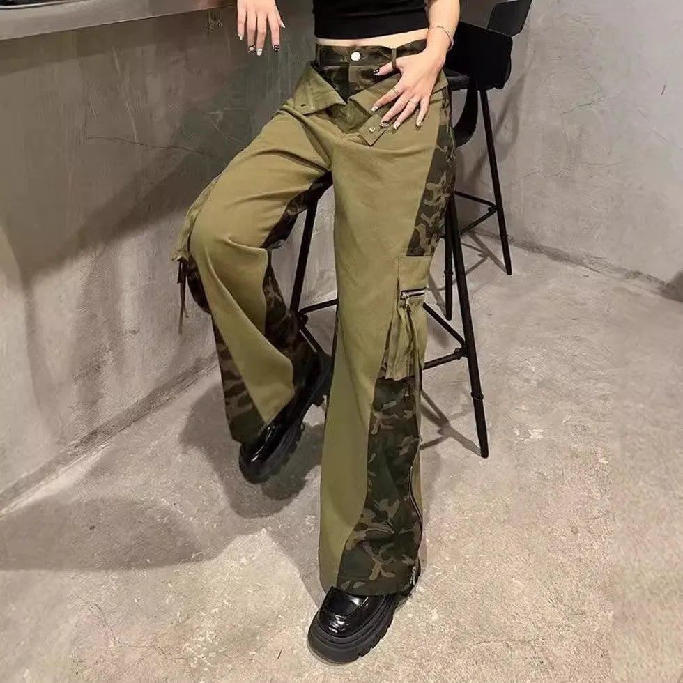 Dark khaki high-waist jeans with a leopard print pattern and tooling-style stitching details on the legs.