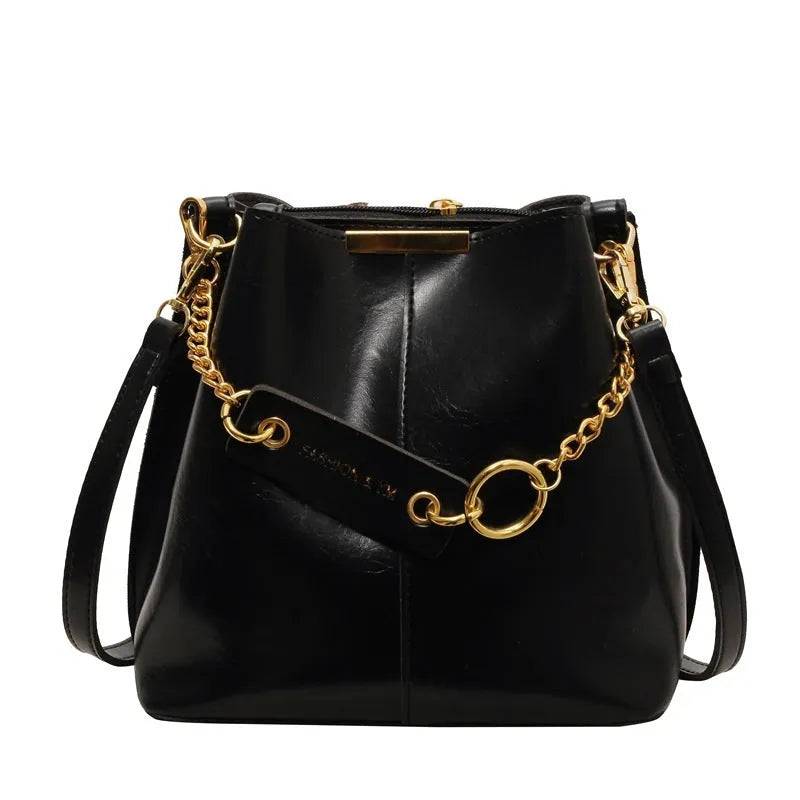 Large capacity PU shoulder bag with wide strap in black colour, sewing thread detail, crossbody style