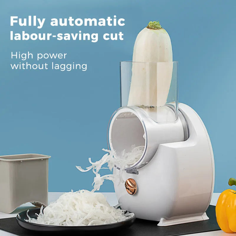 White and green electric vegetable slicer with suction base, feeding port, and multiple blades.