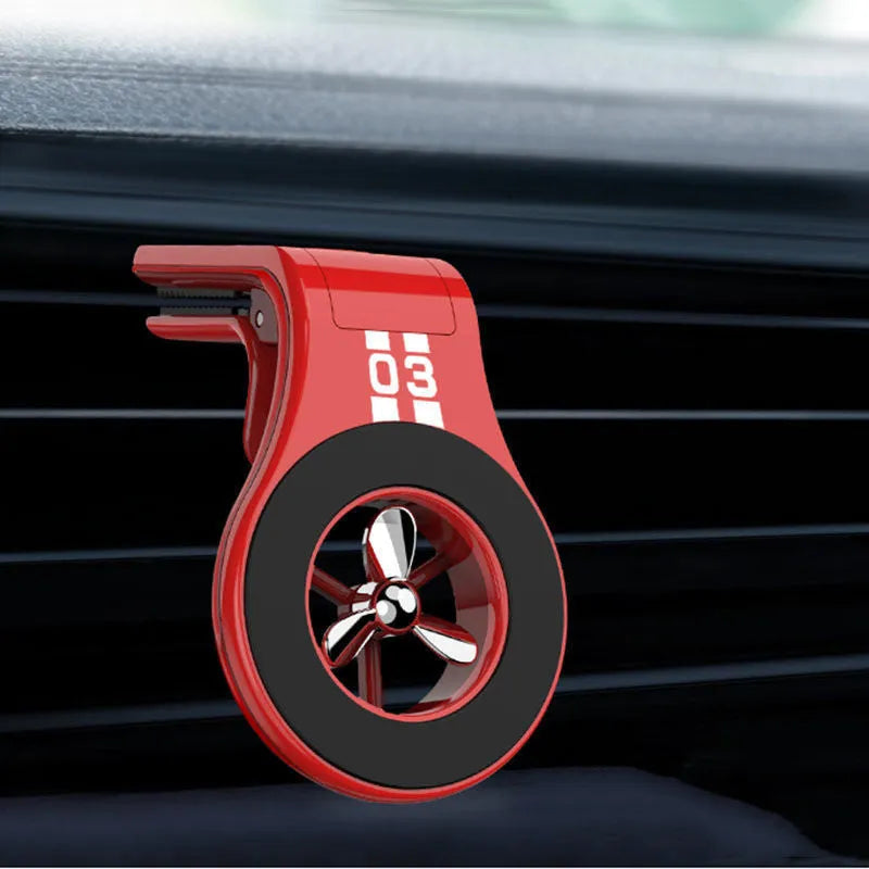 Black magnetic car air vent phone holder with adjustable rotation paddle showing phone mounting position