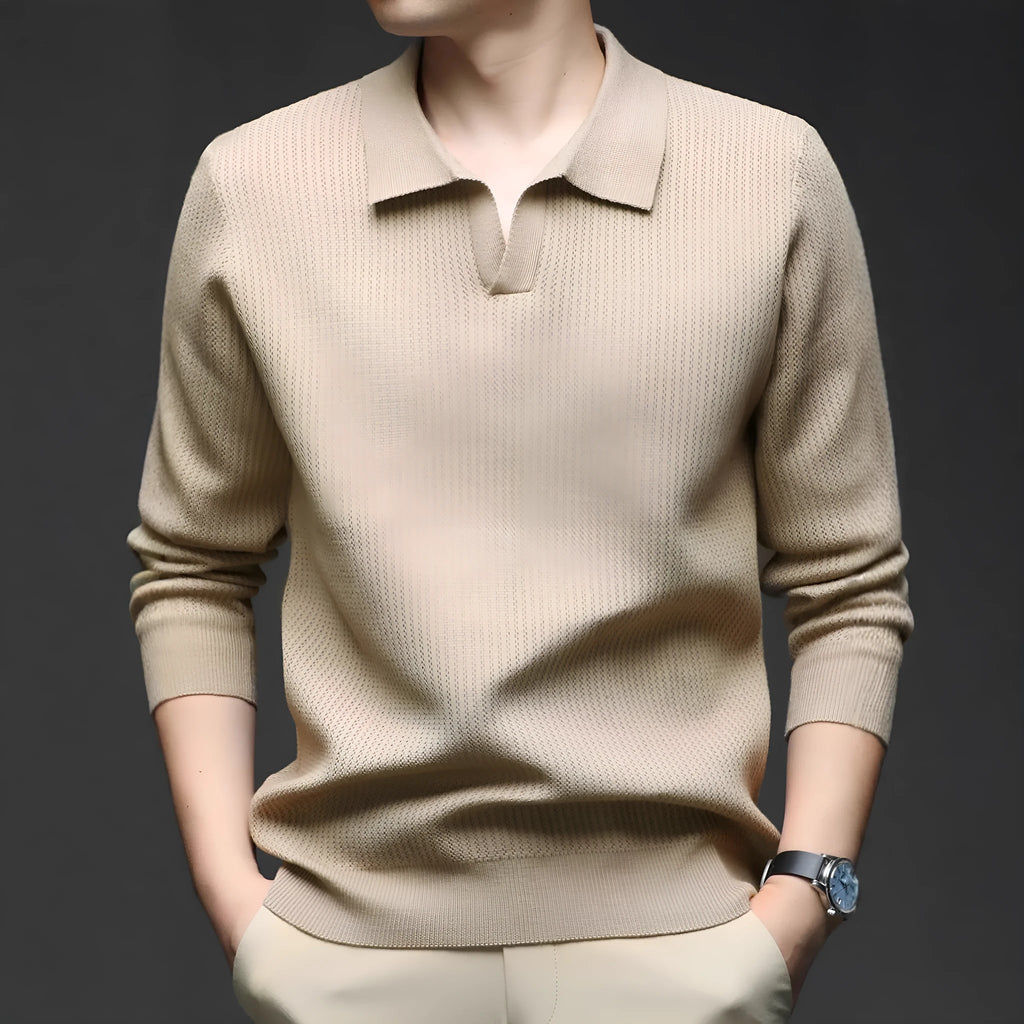 Men's loose green pullover sweater on a hanger, casual autumn wear