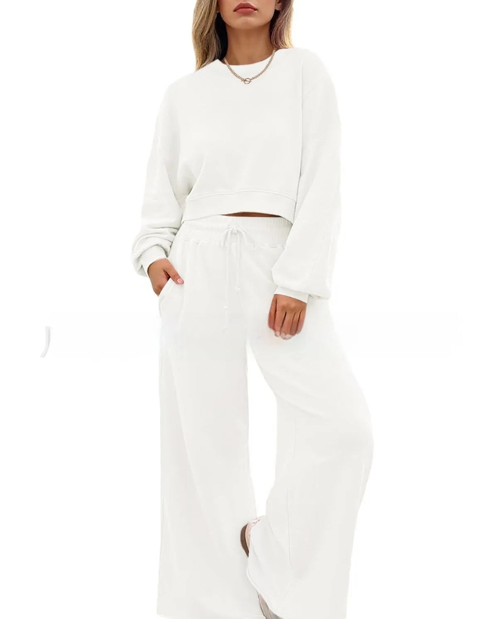 Women's solid colour long sleeve top and trousers casual two-piece set in polyester.