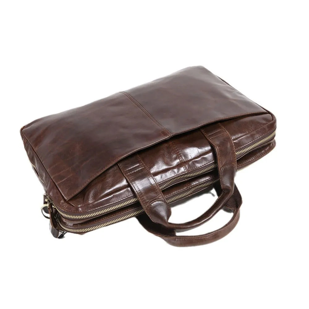 Brown 18 inch men's leather business briefcase open to show polyester cotton lining