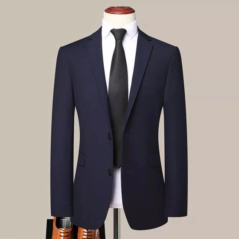 Men's slim fit three-piece suit set in black, including jacket, trousers, and tie on a hanger.
