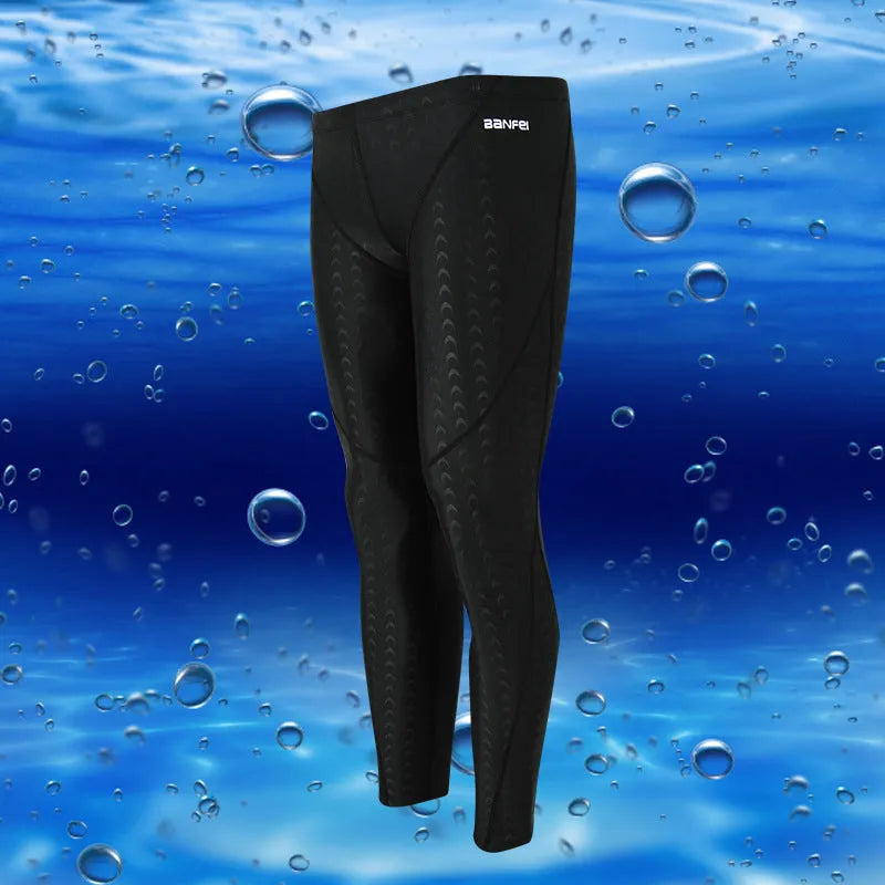 Men's black nylon cropped swimming trunks with green line detail for swimming and sports