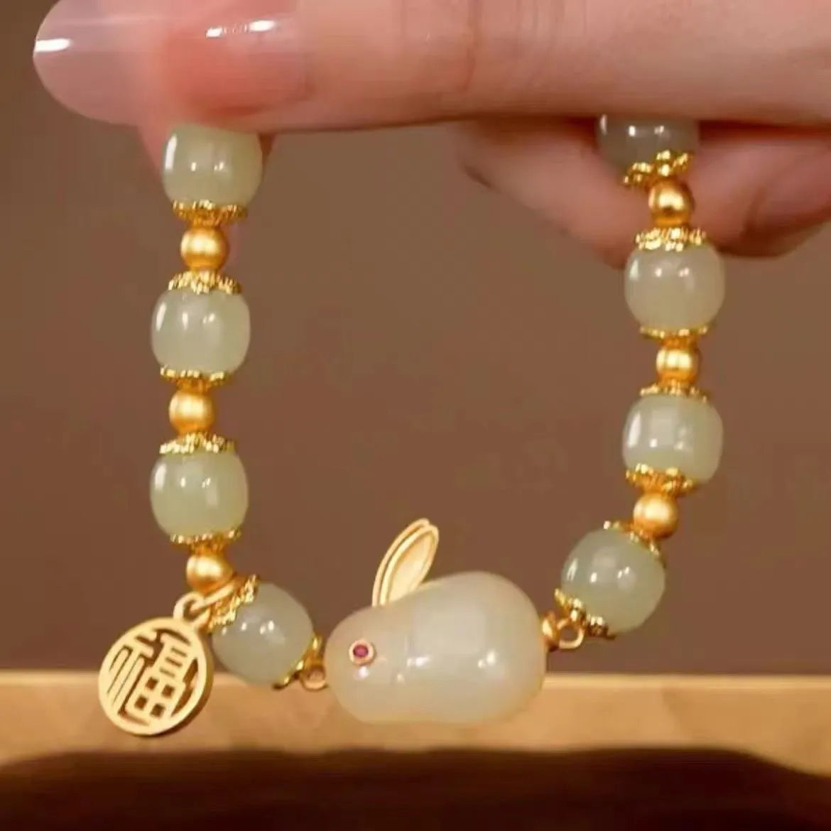 Green lucky jade bracelet with fu character charm and adjustable beaded design