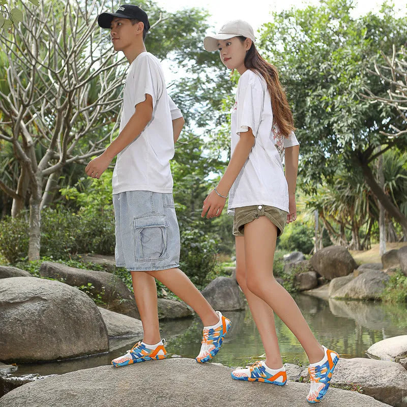 Men's and women's quick-dry wading shoes in multiple colours with mesh upper and rubber outsole.