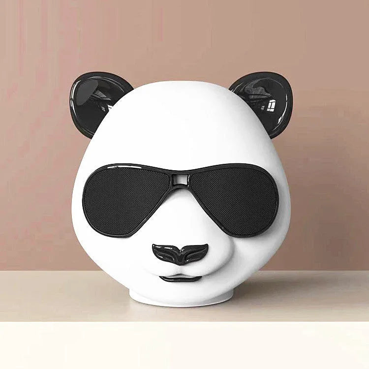 Classic style portable mini Bluetooth speaker with USB port and control buttons.