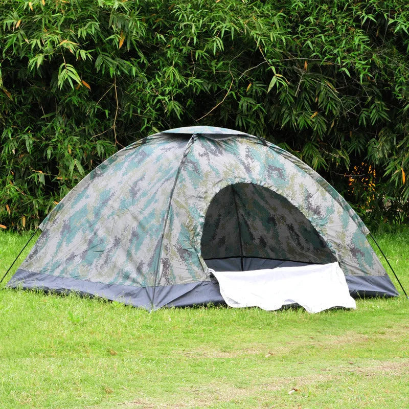 Green digital camouflage outdoor tent with fibreglass poles setup in woodland environment