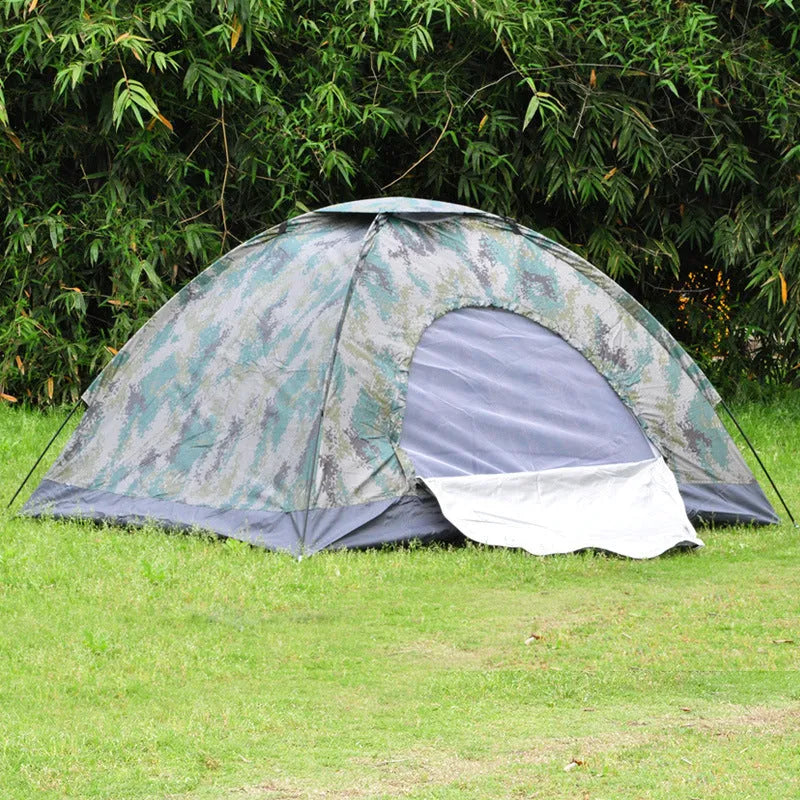 Green digital camouflage outdoor tent with fibreglass poles setup in woodland environment