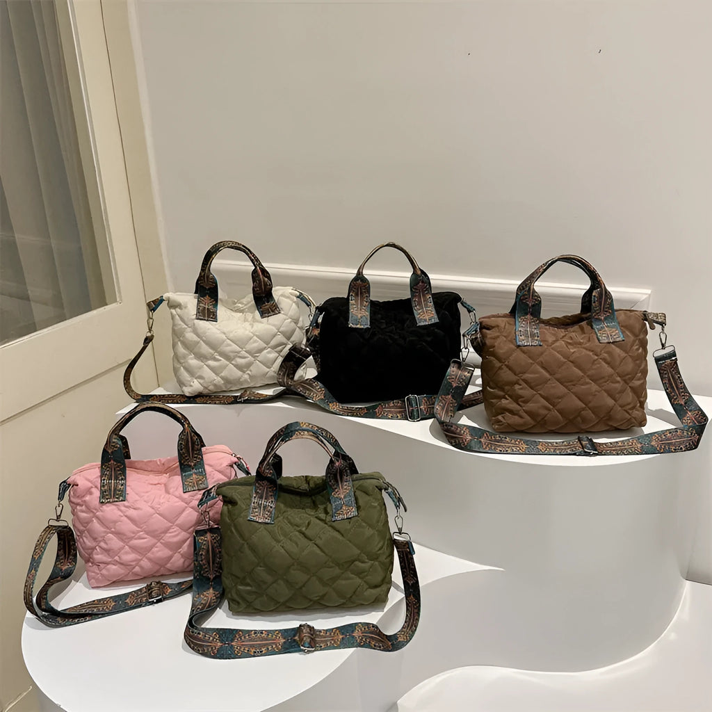 A soft Oxford cloth messenger bag in a horizontal square shape with a single shoulder strap, shown in one of five available colours.