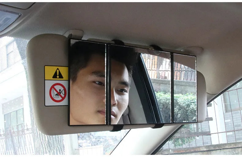 Silver car folding makeup mirror shown closed at 15.5x14cm and opened at 30.5x14cm.