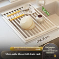 Foldable milky white stainless steel kitchen draining rack showing tri-fold design