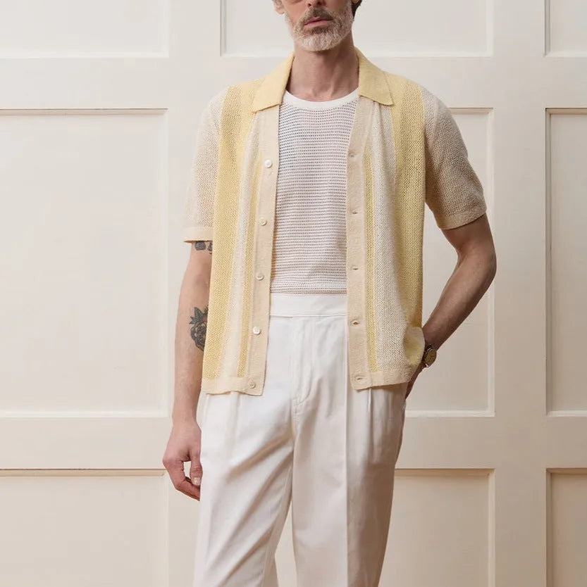 Yellow casual polo shirt with asymmetric hollow-out design and short sleeves