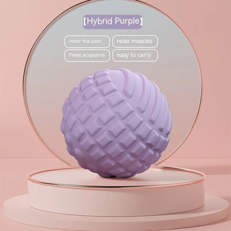 A 6cm diameter TPR foot massage ball shown in one of four colour options: pink, blue, green, or purple.