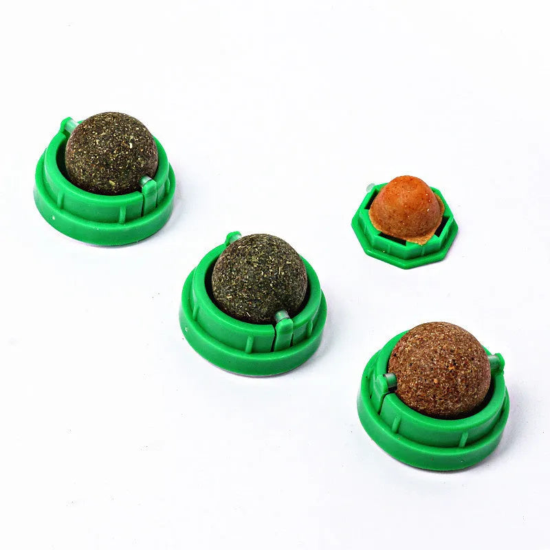 Plastic catnip ball toy with textured teeth cleaning surface in various colours